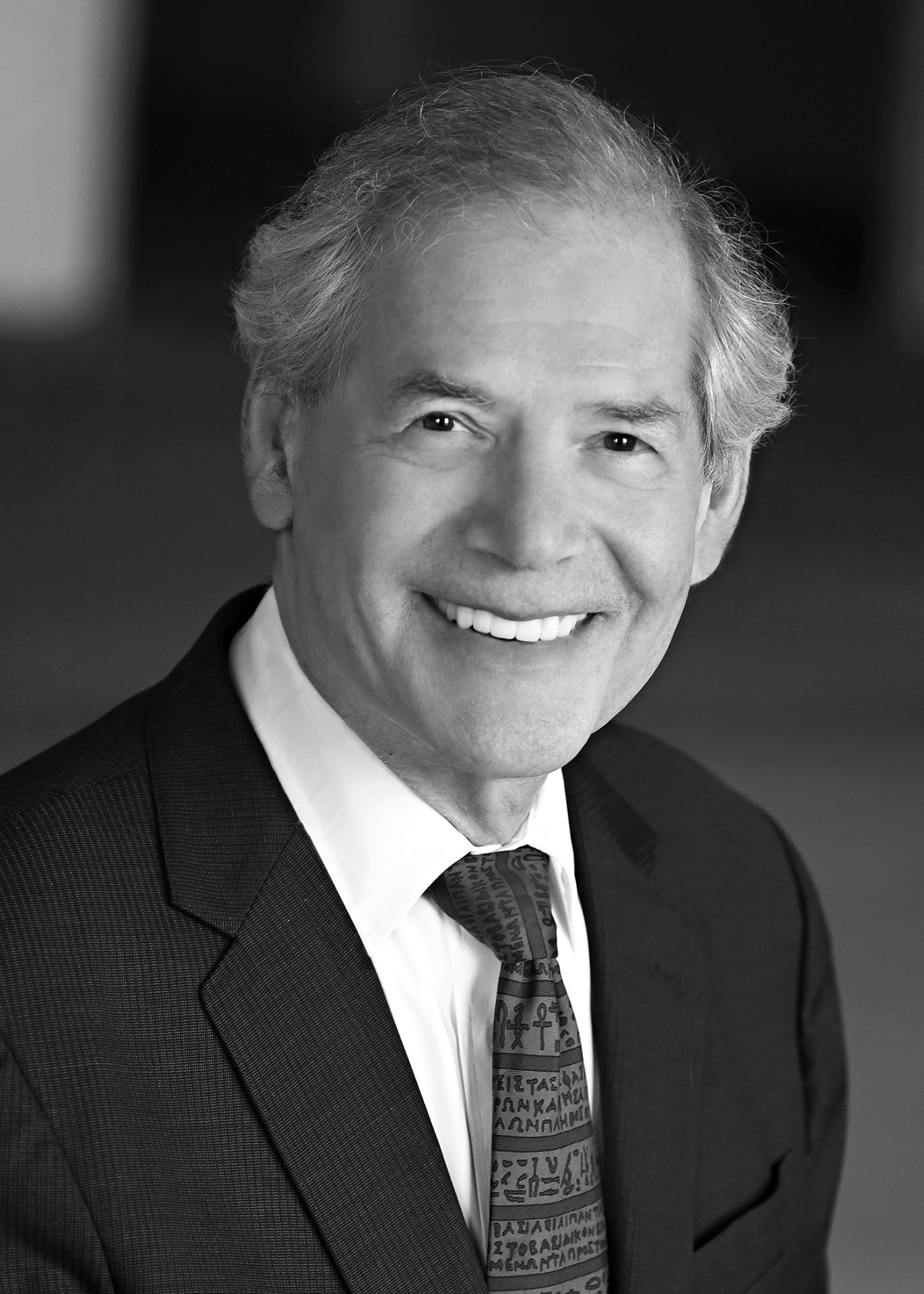 Gregory P. Photiadis, Senior Partner